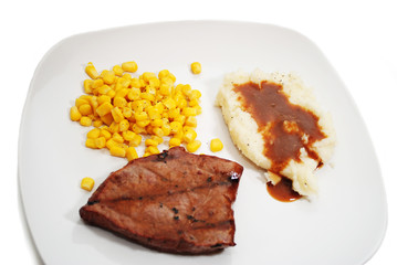 Meal of Lean Grilled Steak with Mashed Potato and Corn