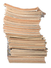 Stack of old magazines on a white