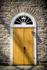 Arched Door in Old Stone Wall