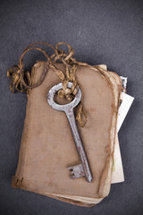 Rusty key and empty photography as a blackout metaphor