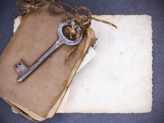 Rusty key and empty photography as a memory metaphor