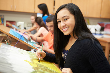 Female Pupil In High School Art Class