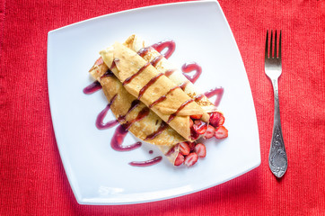 Crepes with fresh strawberries
