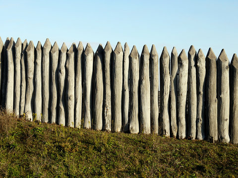 wooden palisade of the protective fence