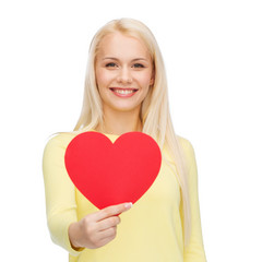 smiling woman with red heart