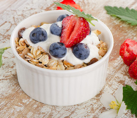 Muesli and yogurt with fresh berries