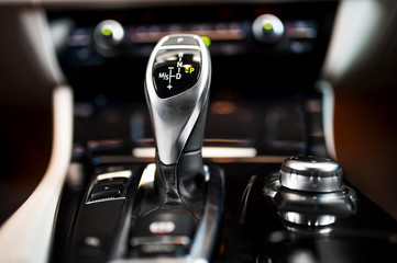 Detail of an automatic gear shifter in a new, modern car