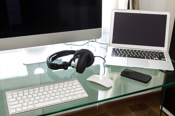 Naklejka na ściany i meble Modern home office with computer and labtop