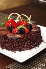Chocolate cake with fresh fruit decoration.