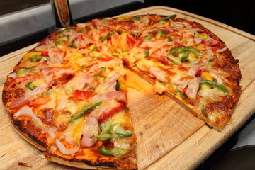 Pizza with diced ham