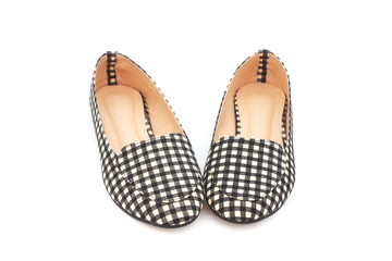 flat lady's shoes with checkered pattern on white background