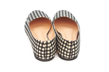 flat lady's shoes with checkered pattern on white background