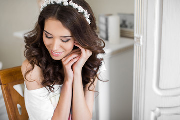 Beautiful young bride wedding makeup and hairstyle