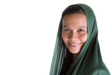 Muslim woman with a green headscarf