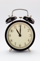 Classic alarm clock at 11 O'clock