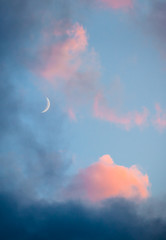 Pink clouds and moon heaven closeup