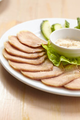 Slices of boiled beef tongue