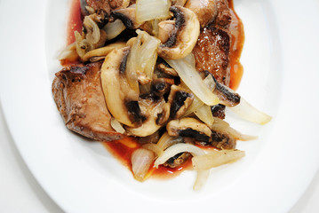 Top View of ushrooms and Onions on Liver