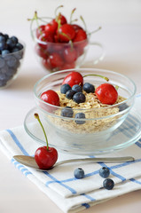 Muesli with fresh berries in a bowl