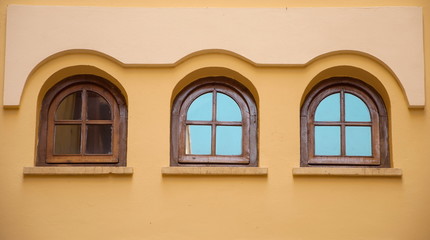 Three windows of a modernist building