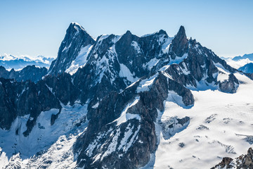 View of Mont Blanc mountain range from Aiguille Du Midi in Chamo