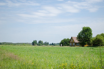 Couple of farm peasants people rake dry grass