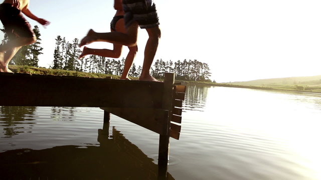 Jumping into the lake from a jetty