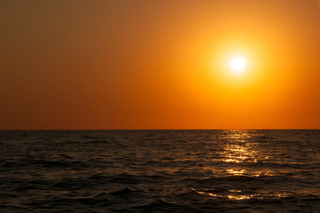 Fototapeta premium Orange Sunset on the sea horizon, skyline