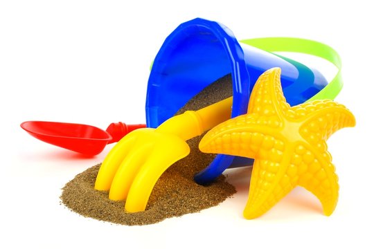 Spilling Toy Sand Pail With Rake, Shovel And Starfish