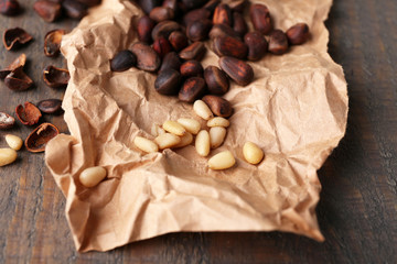 Cedar pine nuts on wooden table
