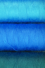 Multicolor sewing threads background