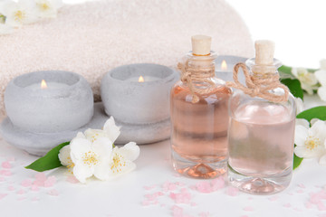 Spa composition with jasmine flowers isolated on white