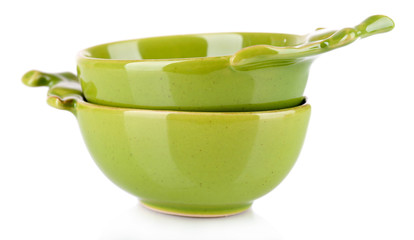 Green empty bowls for olive oil and olives  isolated on white