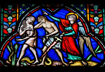 Adam and Eve expelled from the Garden of Eden - stained glass - obrazy, fototapety, plakaty