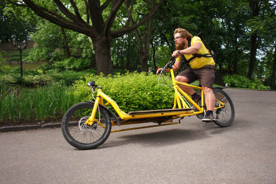 Bicycle Messenger With Cargo Bike Speeding