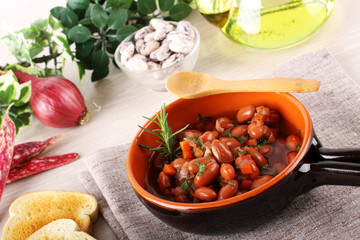 Bean soup in terracotta bowl