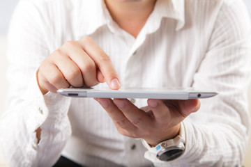 Businessman using tablet