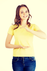 Woman presenting copy space on her palm