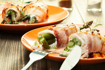 Baked asparagus wrapped in chicken and bacon