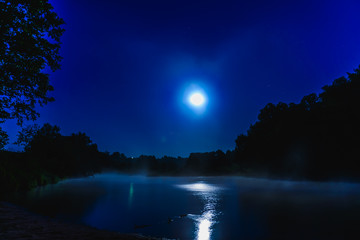 river at night with fog