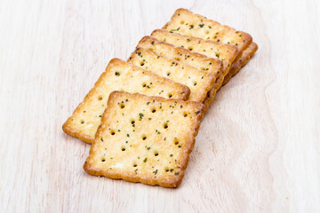 Vegetable cracker on wooden background