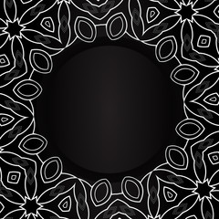 Black circle with silvery ornaments