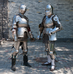 two knights in the ancient metal armor