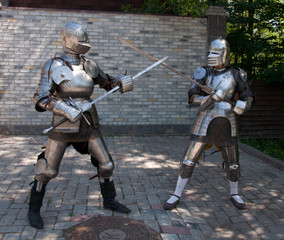two knights in the ancient metal armor