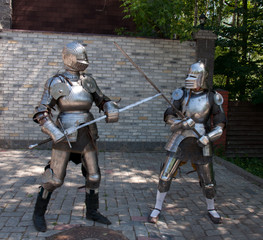 two knights in the ancient metal armor