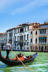 Fototapeta na wymiar Venice canal with gondola, Italy
