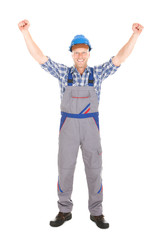 Manual Worker Screaming With Hands Raised