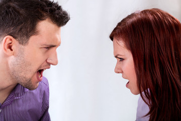 Arguing couple on isolated background