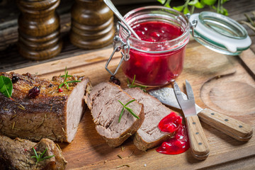 Venison served with cranberry sauce