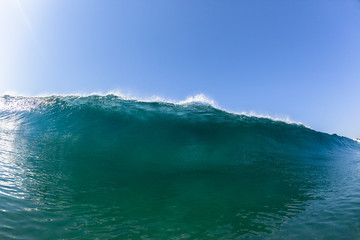 Fototapeta na wymiar Ocean Wave Swimming Blue Water